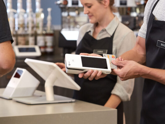 Swiping a credit card on Clover Flex