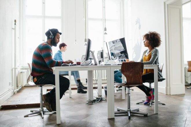 Employees sitting at workstations