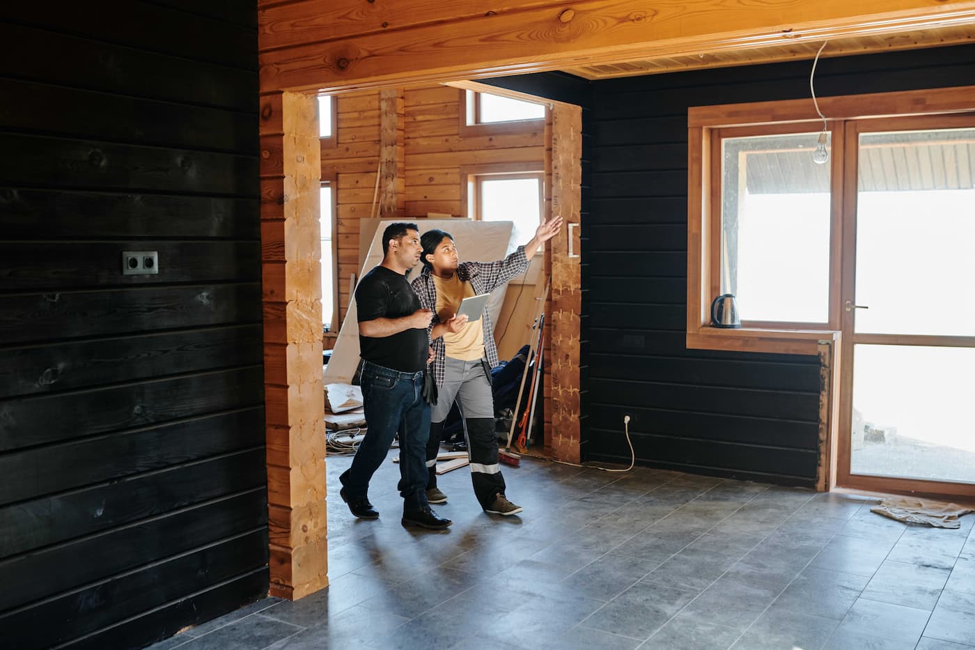 Two people discussing restaurant renovation
